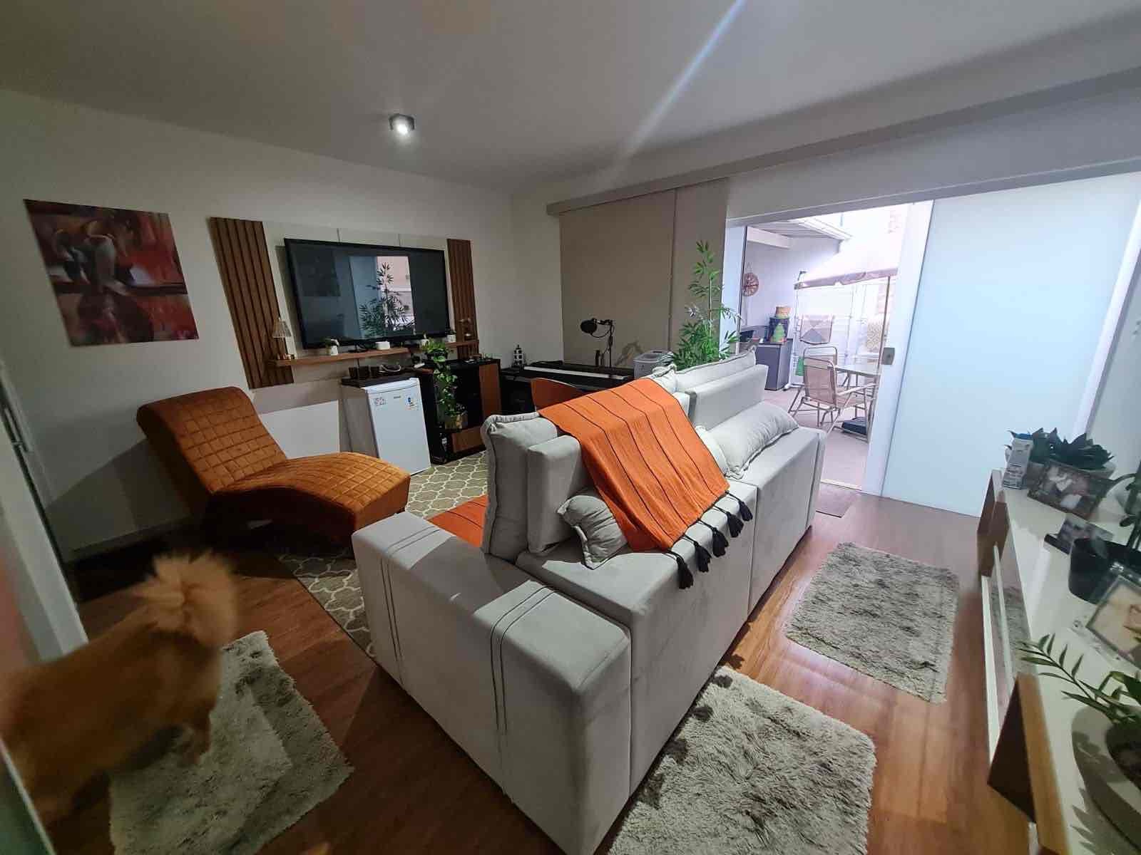 Sala de TV integrada ao terraço